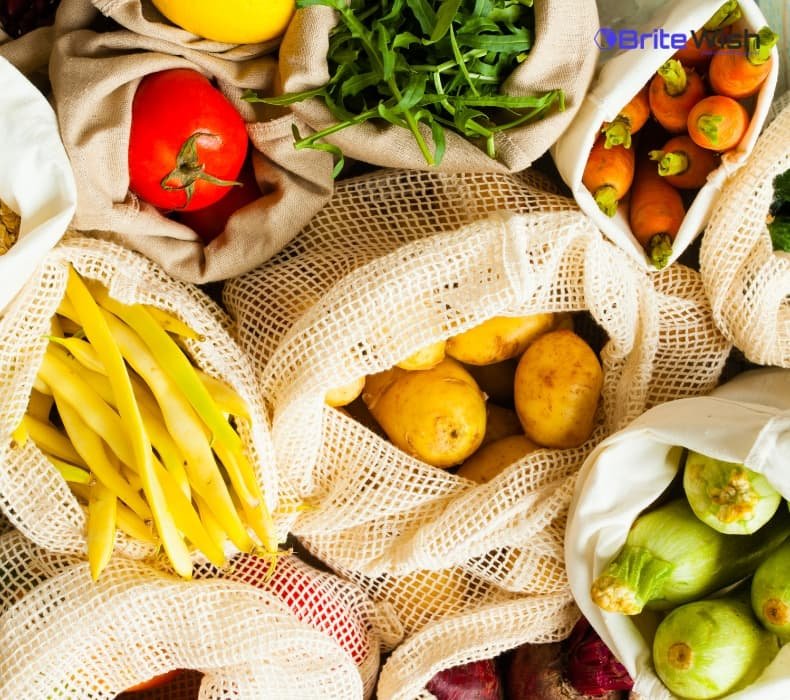 Reusable silicone food storage bags filled with fresh produce